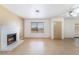 Bright living room with a white brick fireplace and lots of natural light at 411 Monmouth Ct, Henderson, NV 89015