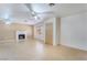 Spacious living room with a fireplace and a neutral color palette at 411 Monmouth Ct, Henderson, NV 89015