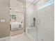 Stylish bathroom with a modern glass shower and a view of the Primary bedroom at 4360 E Brusca Way, Pahrump, NV 89061