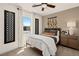 Cozy bedroom featuring a comfortable bed, stylish decor, and ambient lighting at 4360 E Brusca Way, Pahrump, NV 89061