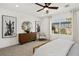 Bright bedroom with a large window, modern furniture, and tasteful decor at 4360 E Brusca Way, Pahrump, NV 89061