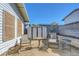 Backyard with a seating area, storage shed, xeriscaping, and a grassy patch at 4445 Peterson Dr, Las Vegas, NV 89103