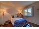 Warm bedroom featuring soft lighting, decor, and bright window at 4445 Peterson Dr, Las Vegas, NV 89103
