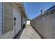 View of the side yard and exterior wall at 4445 Peterson Dr, Las Vegas, NV 89103
