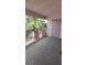 Condo Balcony with large palms and white railings at 4555 Sahara Ave # 252, Las Vegas, NV 89104