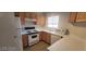 Bright kitchen featuring modern cabinetry, appliances, and plenty of counter space at 4555 Sahara Ave # 252, Las Vegas, NV 89104