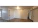 Open living room featuring vinyl floors, large window, and sliding glass doors at 4555 Sahara Ave # 252, Las Vegas, NV 89104