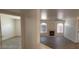 Bright living room featuring neutral paint, fireplace, and wood flooring at 4555 Sahara Ave # 252, Las Vegas, NV 89104
