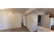 Bright living room featuring vinyl floors and access to other parts of the house at 4555 Sahara Ave # 252, Las Vegas, NV 89104