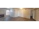 Bright living room featuring fireplace, ceiling fan, and vinyl flooring at 4555 Sahara Ave # 252, Las Vegas, NV 89104