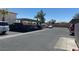 View of community parking lot with covered parking and assigned spots at 4555 Sahara Ave # 252, Las Vegas, NV 89104