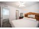 Bedroom featuring neutral tones, a comfortable bed, and convenient access to other living spaces at 4652 Wyncrest Ave, Las Vegas, NV 89115