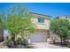 Charming home featuring desert landscaping, a two-car garage, and neutral stucco exterior at 4652 Wyncrest Ave, Las Vegas, NV 89115