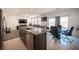 Modern kitchen with stainless steel appliances and granite countertops at 4652 Wyncrest Ave, Las Vegas, NV 89115