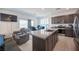 Modern kitchen featuring granite countertops, stainless steel appliances, and ample cabinet space at 4652 Wyncrest Ave, Las Vegas, NV 89115