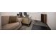 Functional office with a comfortable sofa, desk and carpeted floors at 4652 Wyncrest Ave, Las Vegas, NV 89115
