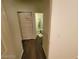 Hallway featuring modern wood floors and linen closet at 4730 E Craig Rd # 1106, Las Vegas, NV 89115