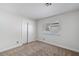Cozy bedroom with carpet floors, a closet, and a window bringing in natural light at 4904 Wiltondale Way, Las Vegas, NV 89130