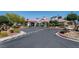 Community clubhouse exterior with well-maintained landscaping, and cart parking at 4904 Wiltondale Way, Las Vegas, NV 89130