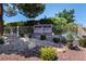 Attractive stone and sign for the Glenden Arden Village community, landscaped with shrubbery at 4904 Wiltondale Way, Las Vegas, NV 89130