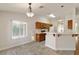 Bright kitchen with light wood cabinetry, laminate countertop, and updated appliances at 4904 Wiltondale Way, Las Vegas, NV 89130