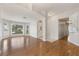Open-concept living area featuring hardwood floors and an abundance of natural light at 4904 Wiltondale Way, Las Vegas, NV 89130