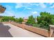 Enjoy tranquil views of lush trees from this spacious balcony, a perfect spot for relaxation and outdoor living at 5186 San Milano Ave, Las Vegas, NV 89141