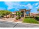 Beautiful two-story home boasts mature landscaping, a three-car garage, and inviting curb appeal at 5186 San Milano Ave, Las Vegas, NV 89141