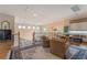 Upstairs living room includes wood flooring and comfortable seating at 5186 San Milano Ave, Las Vegas, NV 89141