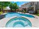 Relax in the inviting pool and spa, complete with lounge chairs and a soothing waterfall feature at 5186 San Milano Ave, Las Vegas, NV 89141
