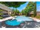 Inviting swimming pool in a private backyard with lush trees offering shade and relaxation at 5186 San Milano Ave, Las Vegas, NV 89141