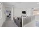 Upstairs loft area with cozy seating and plenty of natural light at 5255 Peak Rock Ct, Las Vegas, NV 89141