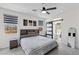 Beautiful main bedroom with windows and barn door to bathroom at 5255 Peak Rock Ct, Las Vegas, NV 89141
