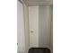 A white interior door with simple gold colored hardware, and light neutral walls at 555 E Silverado Ranch Blvd # 1123, Las Vegas, NV 89183
