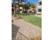 Well-manicured grass between apartment buildings. Nice exterior at 555 E Silverado Ranch Blvd # 1123, Las Vegas, NV 89183