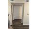 Hallway with closet and dark wood-style flooring in a neutral color palette at 555 E Silverado Ranch Blvd # 1123, Las Vegas, NV 89183