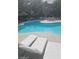 Community pool area with lounge chairs and tables for relaxing at 555 E Silverado Ranch Blvd # 1123, Las Vegas, NV 89183