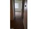 View of a carpeted bedroom with a window covered by blinds at 5750 E Hacienda Ave # 202, Las Vegas, NV 89122