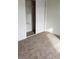 Bedroom featuring neutral walls, closet with sliding doors, and carpeted flooring at 5750 E Hacienda Ave # 202, Las Vegas, NV 89122