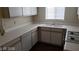 Close-up of a kitchen featuring a white sink and countertop at 5750 E Hacienda Ave # 202, Las Vegas, NV 89122