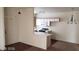 An open living space combines the kitchen and living room at 5750 E Hacienda Ave # 202, Las Vegas, NV 89122