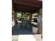 A shaded patio offers outdoor seating in a common area of the community at 5750 E Hacienda Ave # 202, Las Vegas, NV 89122