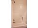 Close-up of a shower and tub combination featuring tile walls and standard shower fixtures at 5750 E Hacienda Ave # 202, Las Vegas, NV 89122