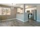 Bright dining area with natural light and a view of the kitchen and stainless-steel appliances at 6873 Tamarus St # 201, Las Vegas, NV 89119