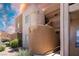 Exterior view of the apartment building with unique architectural details at 6873 Tamarus St # 201, Las Vegas, NV 89119
