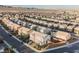 Stunning aerial view of a residential neighborhood with mountain views in the distance at 7002 Fossil Rim St, North Las Vegas, NV 89084
