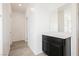 Bathroom featuring a single sink vanity and wood look flooring at 7002 Fossil Rim St, North Las Vegas, NV 89084