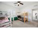 Bedroom with ceiling fan and bunk beds perfect for  at 7002 Fossil Rim St, North Las Vegas, NV 89084