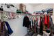 Walk-in closet offering ample storage with rods and shelves for organized living at 7002 Fossil Rim St, North Las Vegas, NV 89084