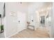Bright entryway with natural light, bench, and stylish decor at 7002 Fossil Rim St, North Las Vegas, NV 89084